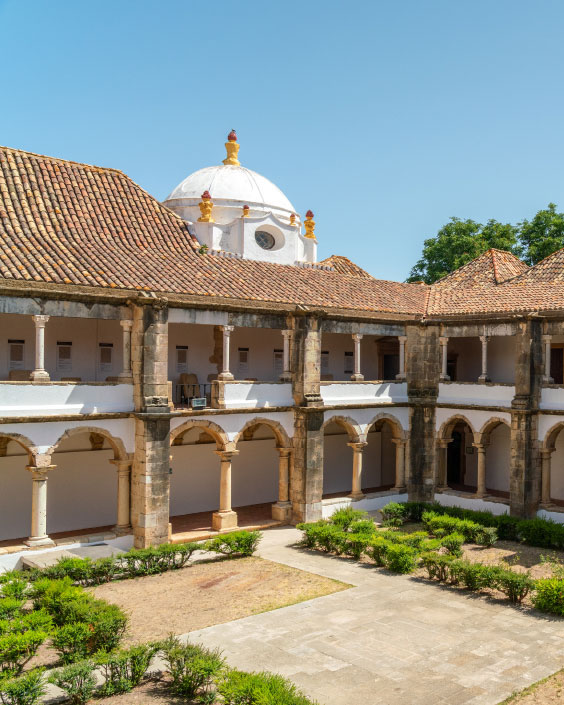 Historic courtyard with arches and dome