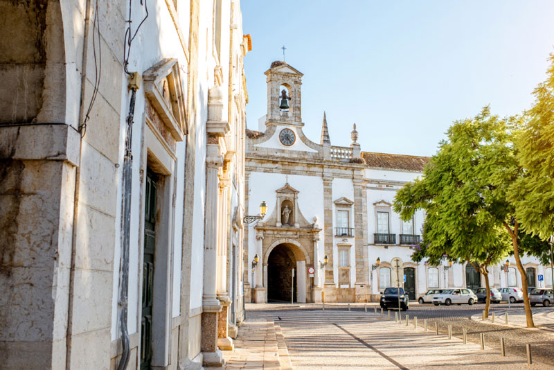 Historic Portuguese building in sunny square.