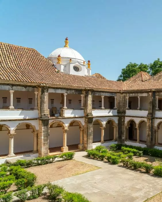Historic courtyard with arches and dome