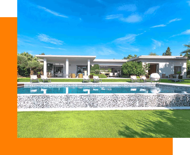 Luxurious poolside villa with lush garden