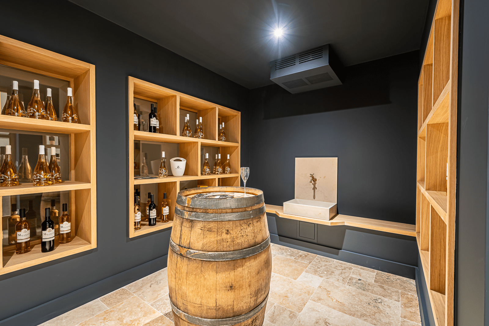 BDS-20_02 Modern wine cellar with wooden shelves and barrel