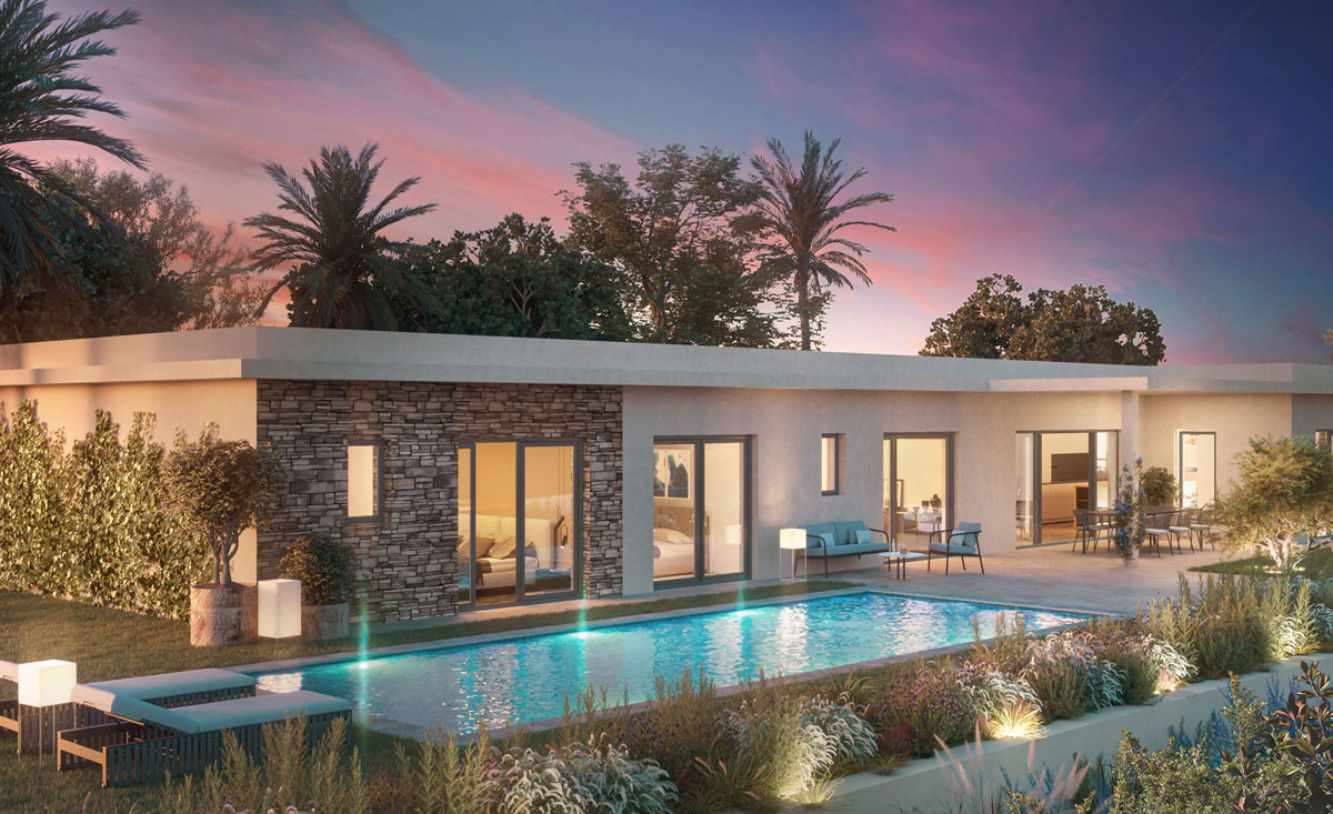 Modern villa with garden and swimming pool at sunset.